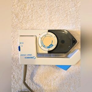 Vintage Norelco TI-70 Spray steamer/iron